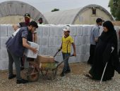 وزارة الهجرة توزع حصصاً اغاثية بين أكثر من تسعة آلاف أسرة نازحة في مخيمات أقليم كردستان