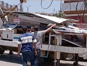 ازاله ٢٧ اعلان مخالف علي أعمدة الإنارة بدون ترخيص