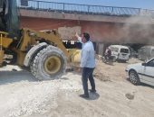 الجيزة ترفع كفاءة شارع المصرف ببولاق الدكرور بجوار مطالع ومنازل الطريق الدائري